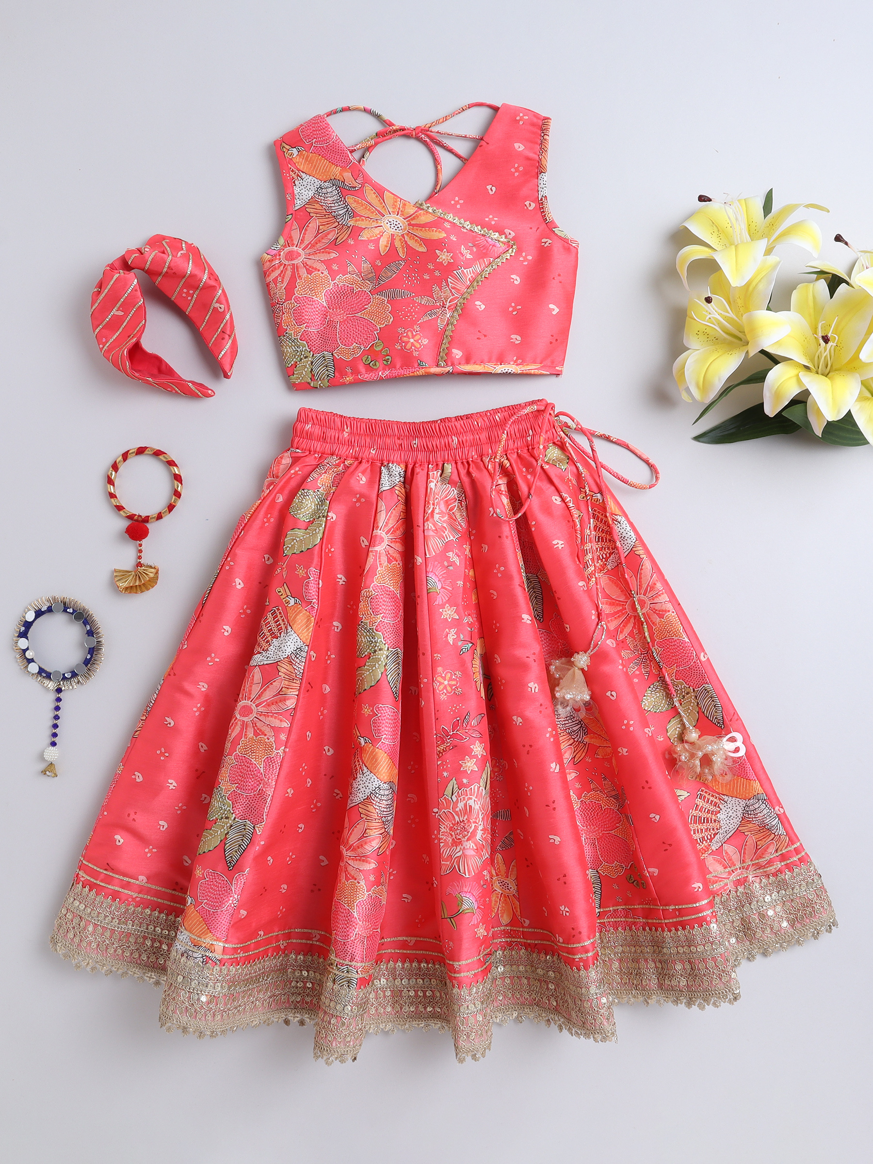 Kids coral red printed flared skirt with elastic waistband and matching tassel necklace