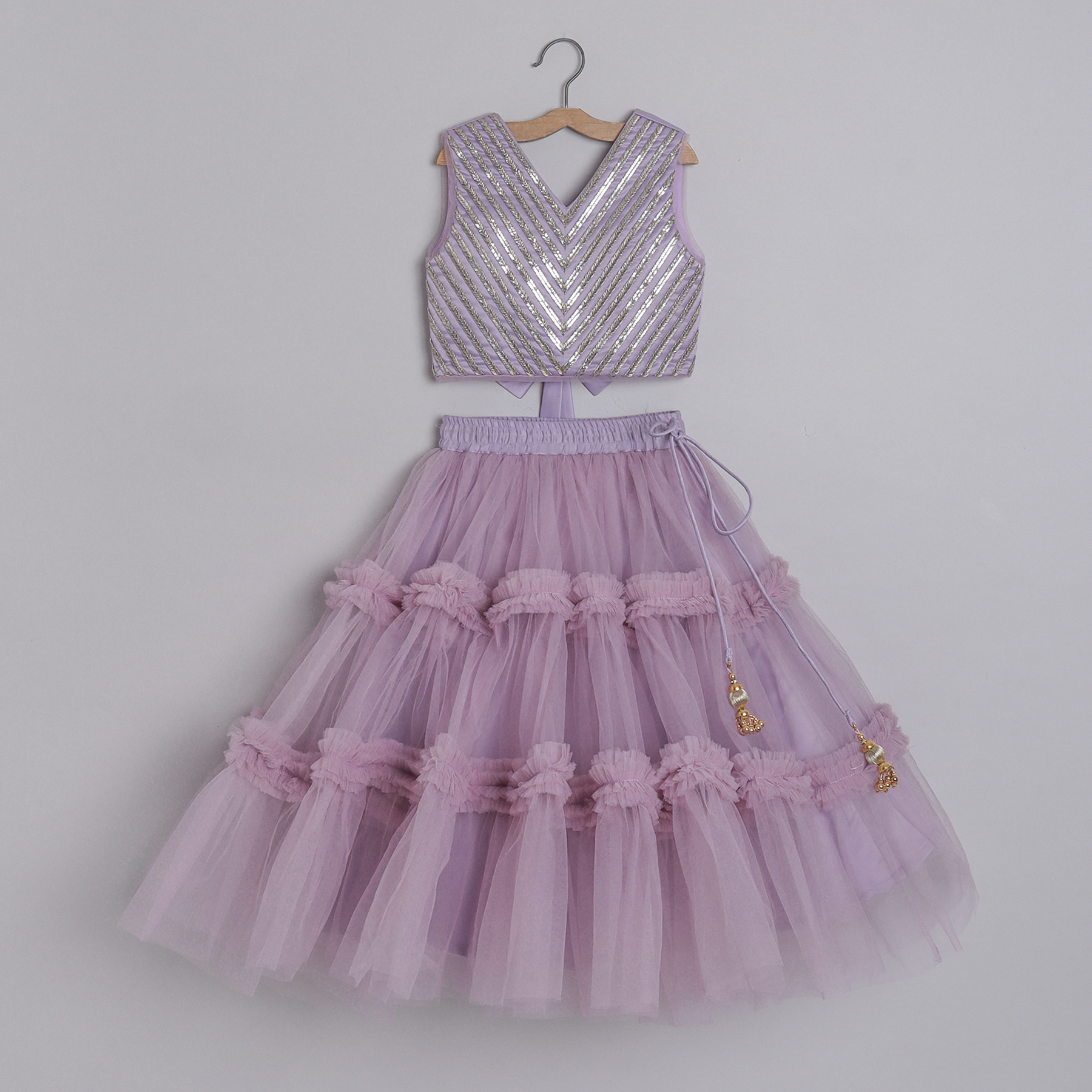 Lavender kids ethnic outfit with embroidered crop top and layered tulle skirt with ruffle detailing